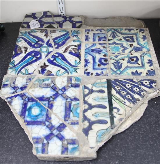A Syrian fragmentary tile panel, 17th century and later, 59 x 47.5cm